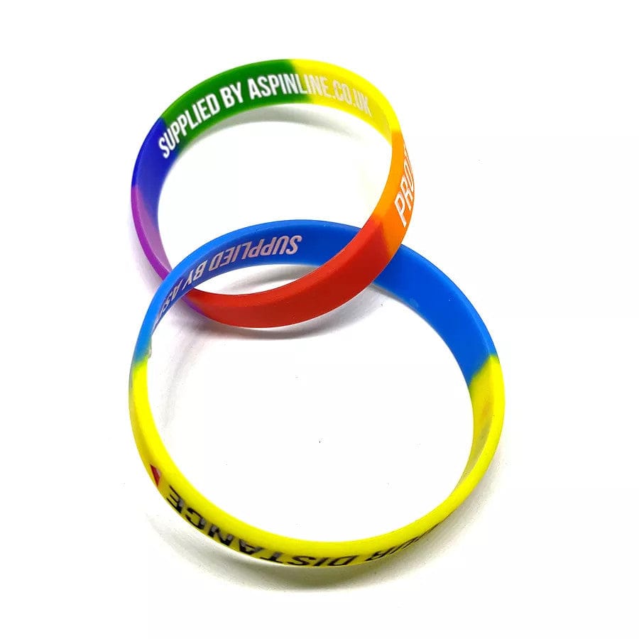 Multicolored rubber bracelets with a motto and the company name.