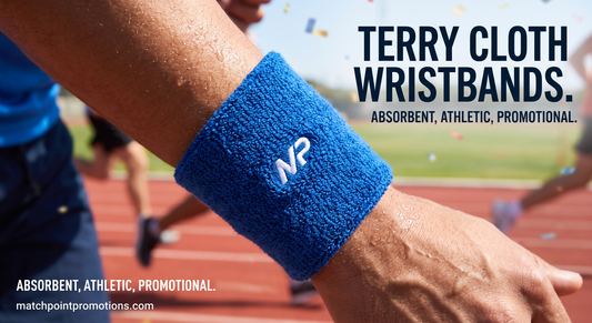 Custom embroidered terry cloth wristbands showing a stitched team logo