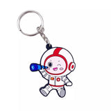 Custom keychain shaped like a cartoon astronaut holding a telescope.