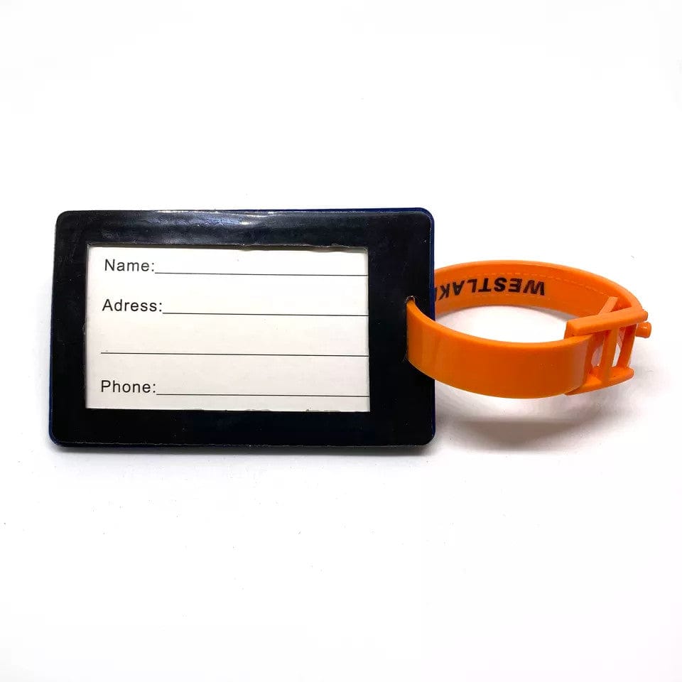 Black custom bag tag with a name, address, and phone insert card and an orange Westlake strap.