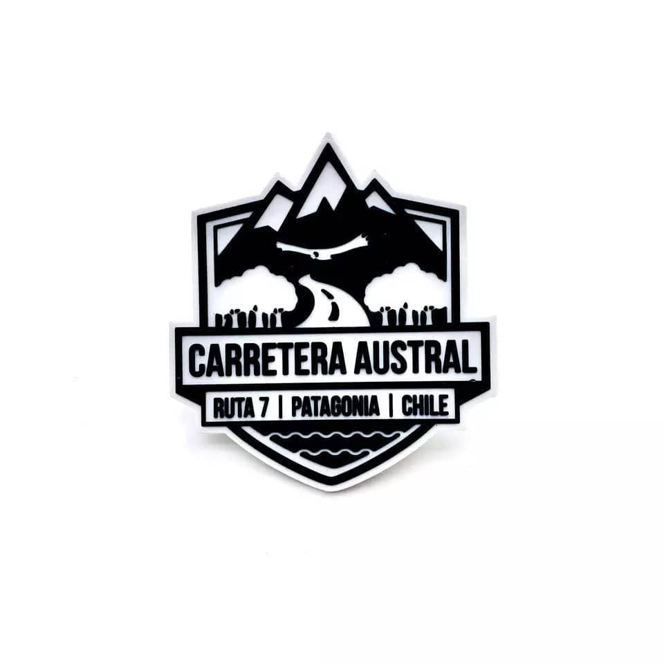 Black and white shield-shaped custom magnet reading "Carretera Austral, Ruta 7, Patagonia, Chile".