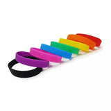 Row of rubber bracelets showing the possible custom color options.