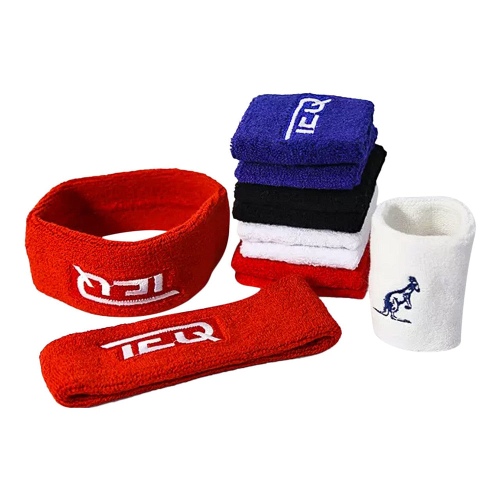 A set of custom terry cloth wristbands and a matching headband in team colors with embroidered logos.