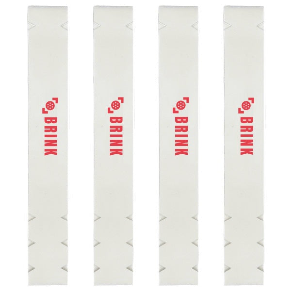 Four white custom pickleball edge guard tape strips printed with a red BRINK logo, with notched sawtooth edges.