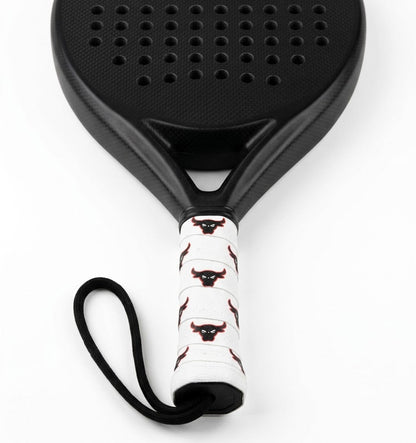 Padel racket with a white custom overgrip printed with a repeating black and red bull head logo.