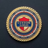 Gold custom challenge coin with blue, red, and white enamel around a center "Custom Logo" sample design