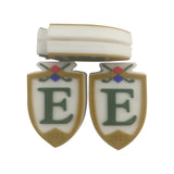 Custom shield-shaped vibration dampeners with the club's logo and founding year.