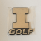 Chrome 3D car emblem of the Illinois block "I" with "Golf" lettering, shown in its packaging.