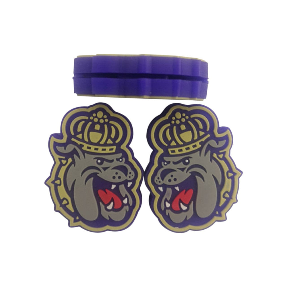 Two custom vibration dampeners shaped like the team's bulldog mascot.