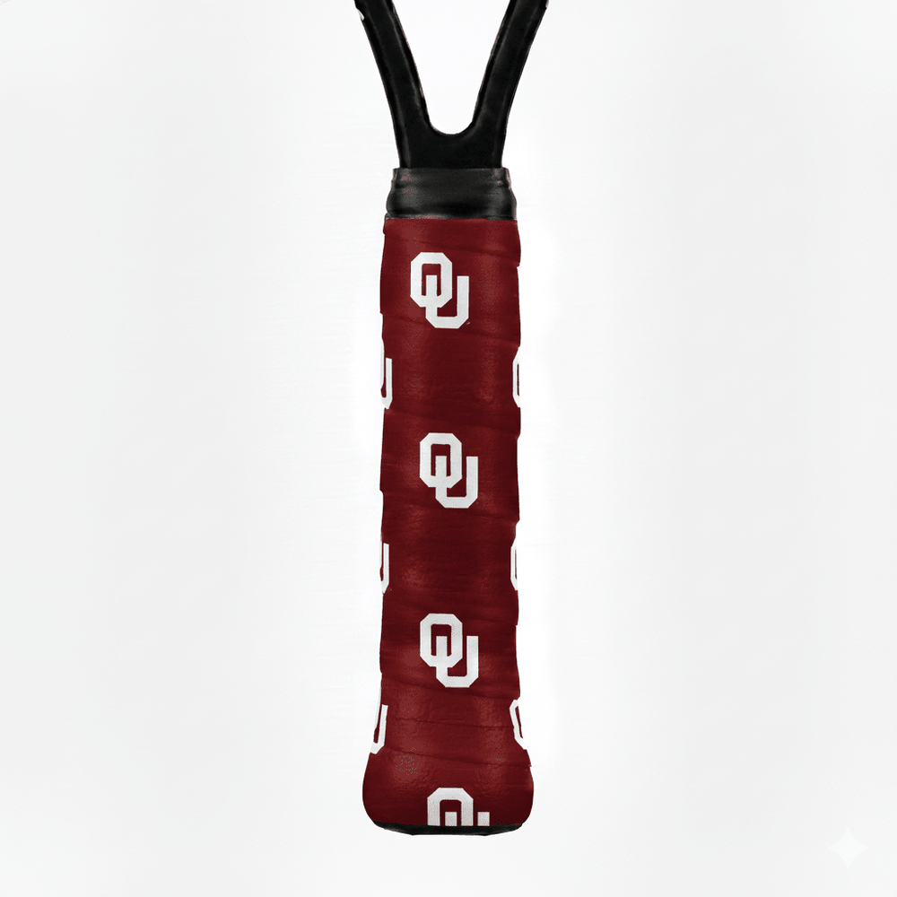 Crimson custom tennis overgrip printed with a repeating white Oklahoma "OU" logo on a racket handle.